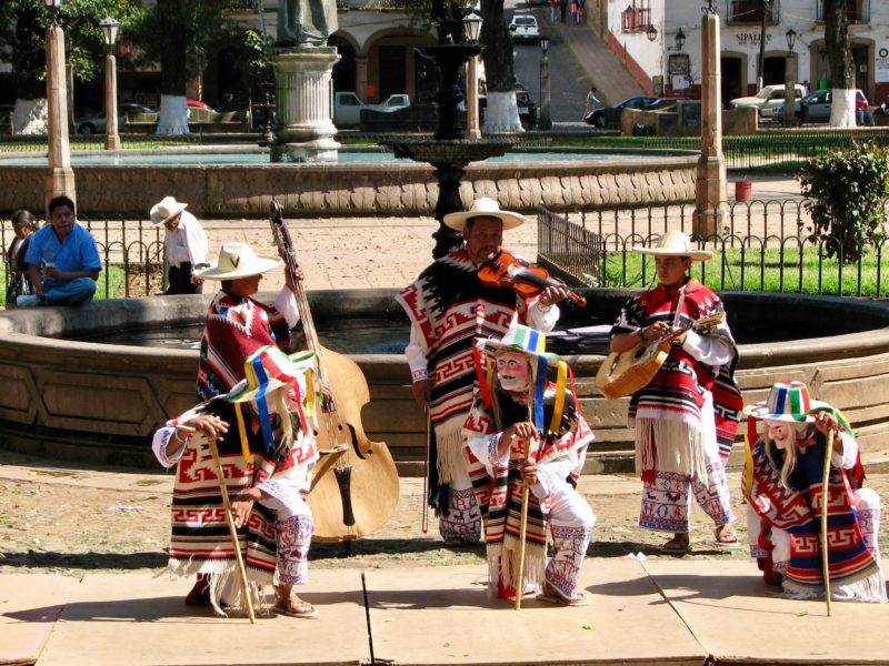 Performers doing the Los Viejitos, a traditional Mexican dance