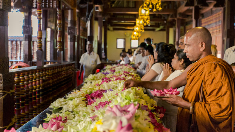 Worshippers at Kandy's Temple of the Tooth