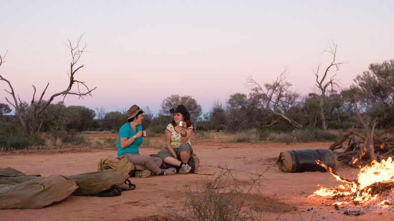Two women drinking tea in the outback