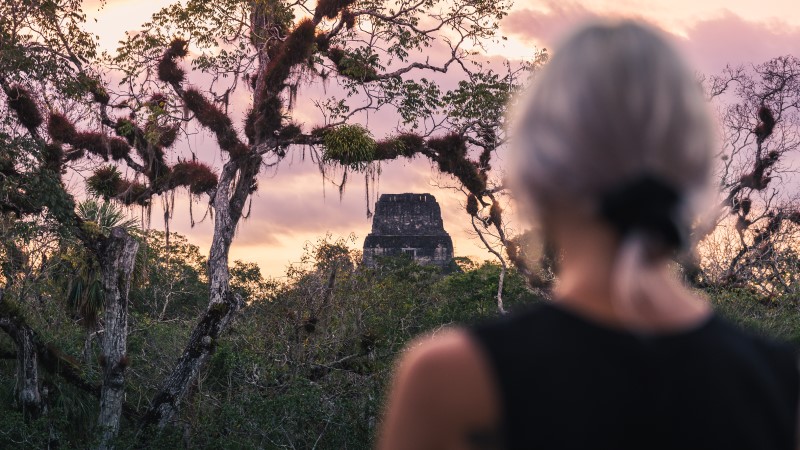 Admiring the sunset over Tikal in Guatemala