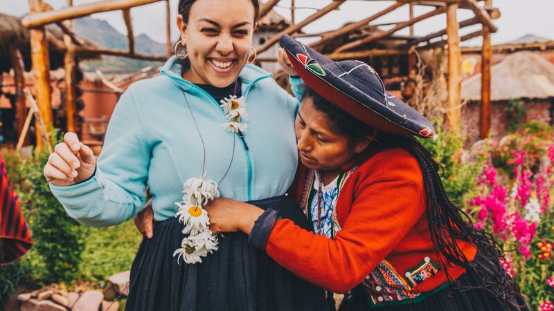 Two women in Peru wearing traditional costumes