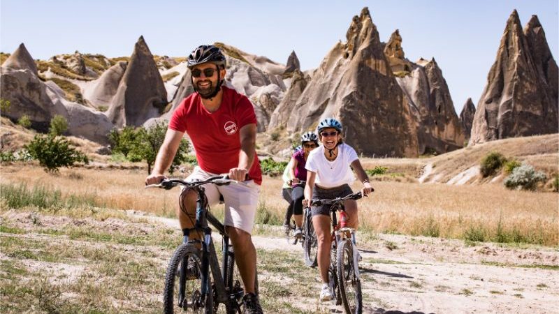 People cycling through Cappadocia in Turkey