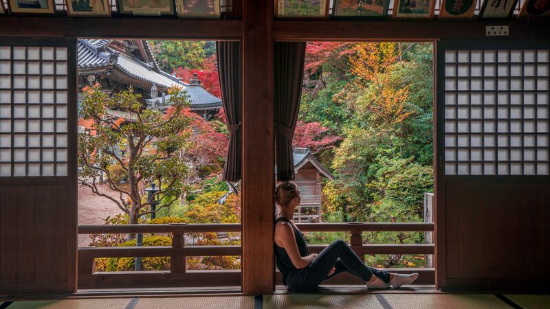 A woman sitting in a ryokan