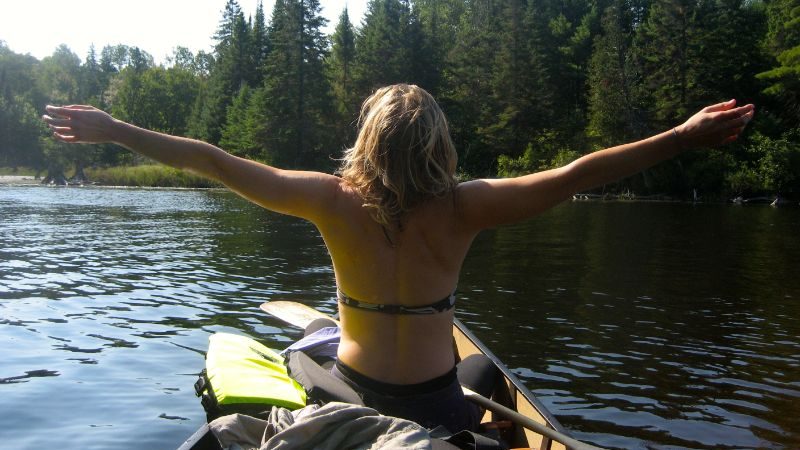 A woman in a canoe in Canada.