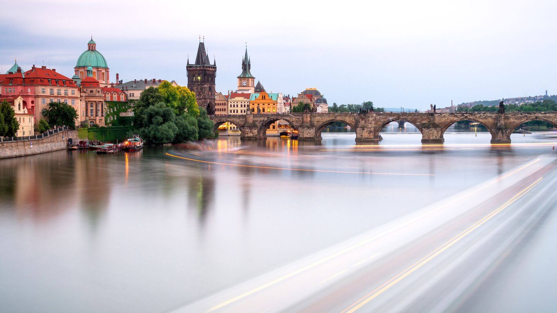 A time-lapse of the Charles Bridge over the river, Prague