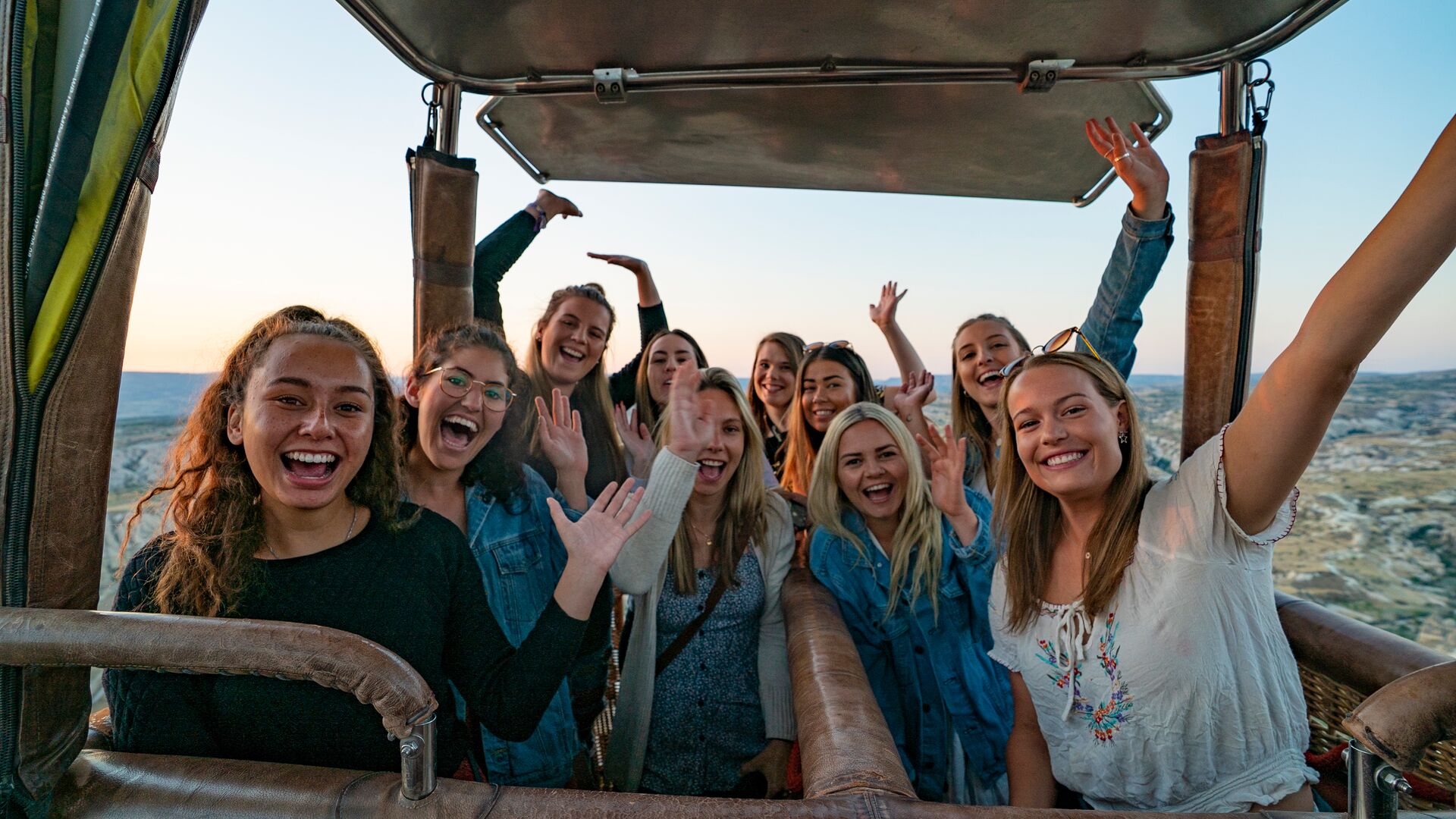 A group of female travellers in a hot air balloon in Cappadocia, Turkey