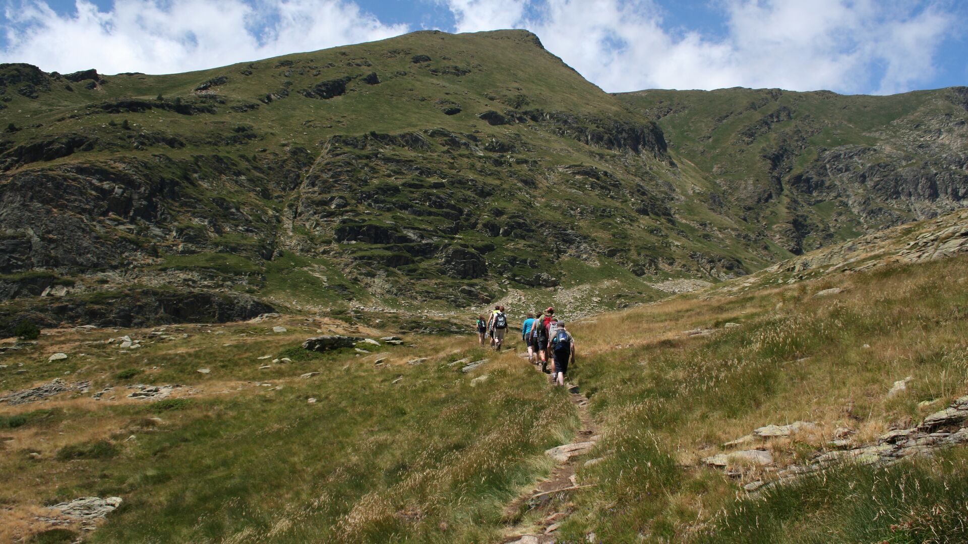 A group of hikers on a trail in the Pyrenees