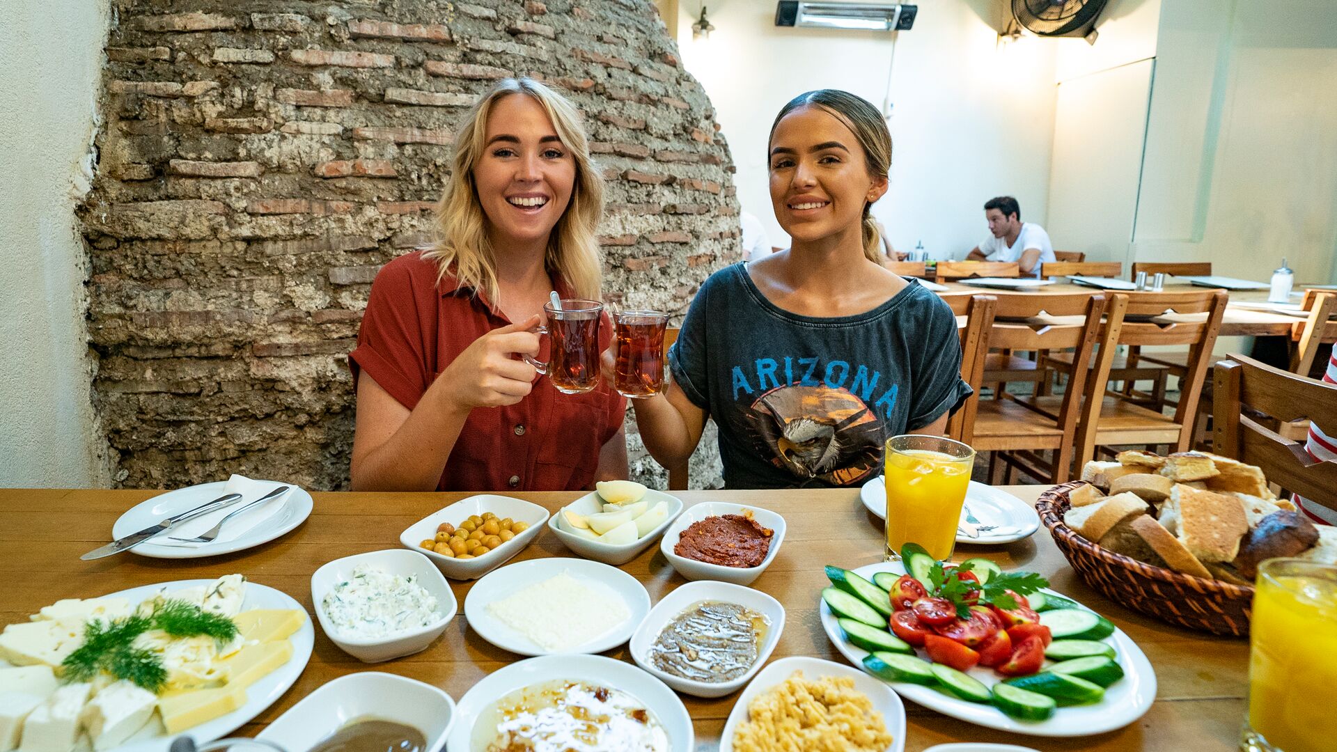 Two travellers enjoying a traditional meal in Turkey