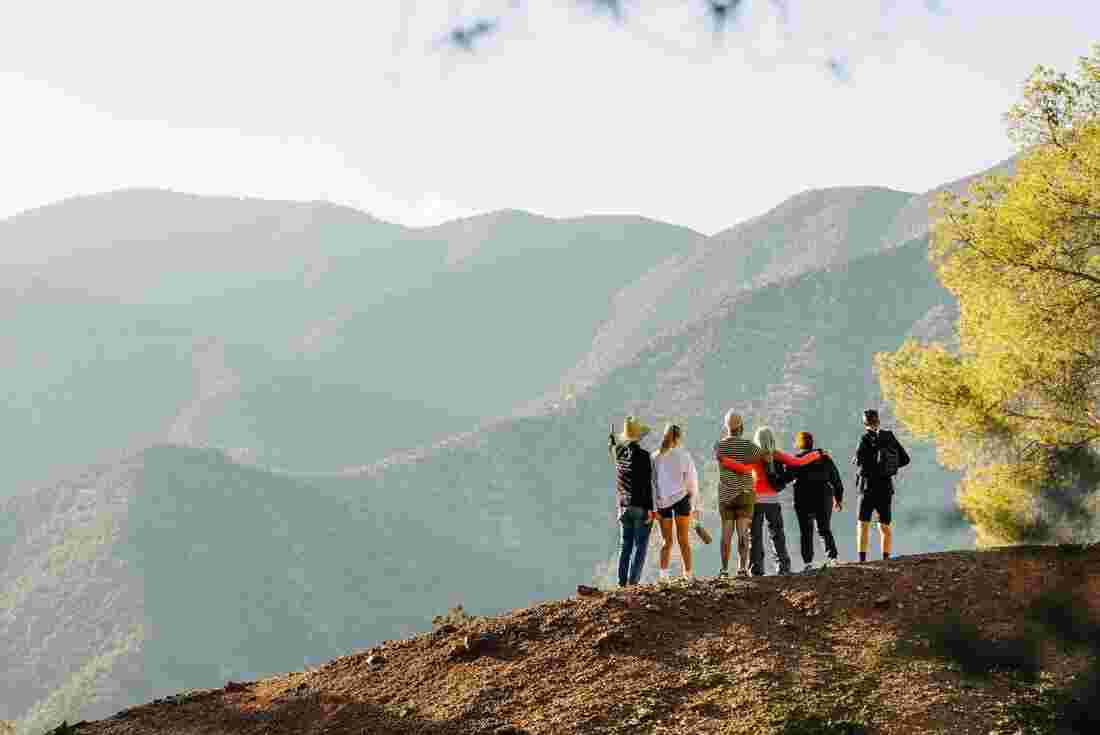 A group of travellers looking out over Ouirgane