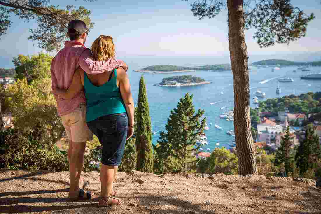 Intrepid travellers view ocean from Hvar Island, Croatia