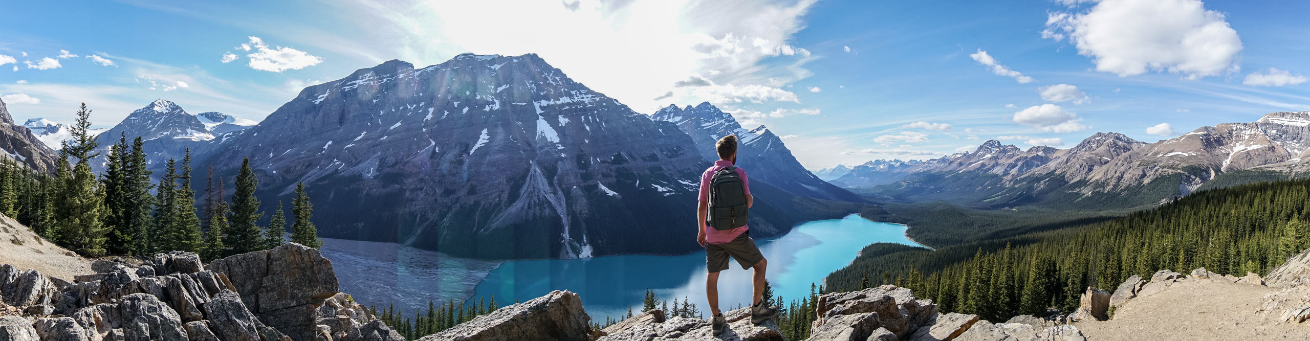 Canada Tours Holiday Packages 2024 2025 Intrepid Travel AU   Intrepid Travel Canada GettyImages 862664814 2560 Young Man Hiker On Rock Above Mountain Lake In Springtime. People Success In Nature ConceptPanoramic Of Young Man Hiker On Rock Above Mountain Lake 