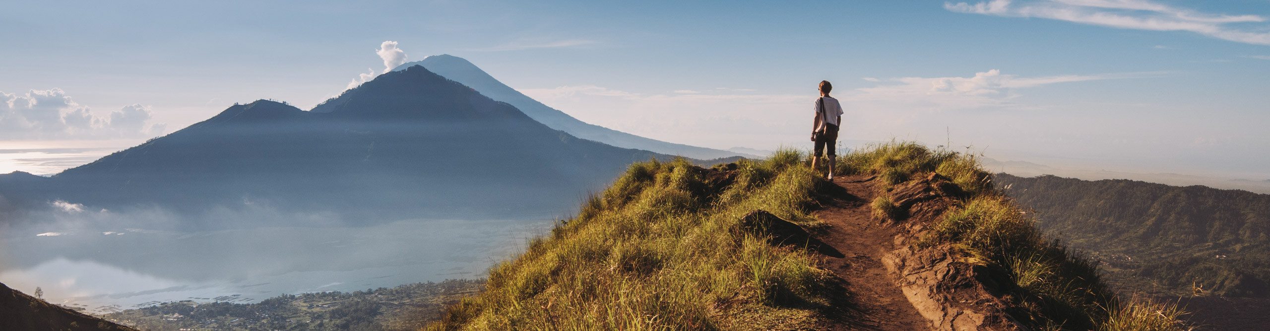 Best Indonesia Tours Vacations 2024 2025 Intrepid Travel US   Intrepid Travel Indonesia GettyImages 466108943 2560 Hiker Staying On Top Of Mount Batur 