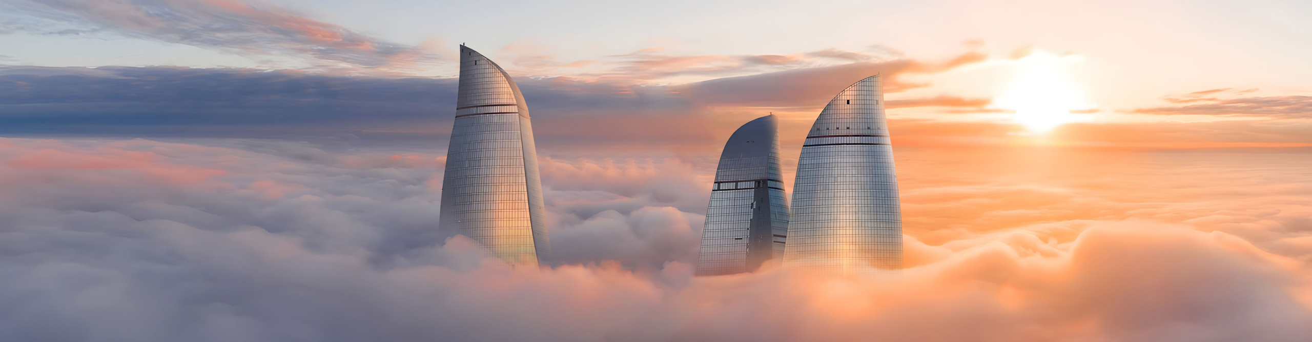 Best Azerbaijan Tours Vacations 2024 2025 Intrepid Travel US   Intrepid Travel SS 2269703911 Flame Towers Among The Clouds Baku Azerbaijan. Orange Frequent Clouds. 2560 