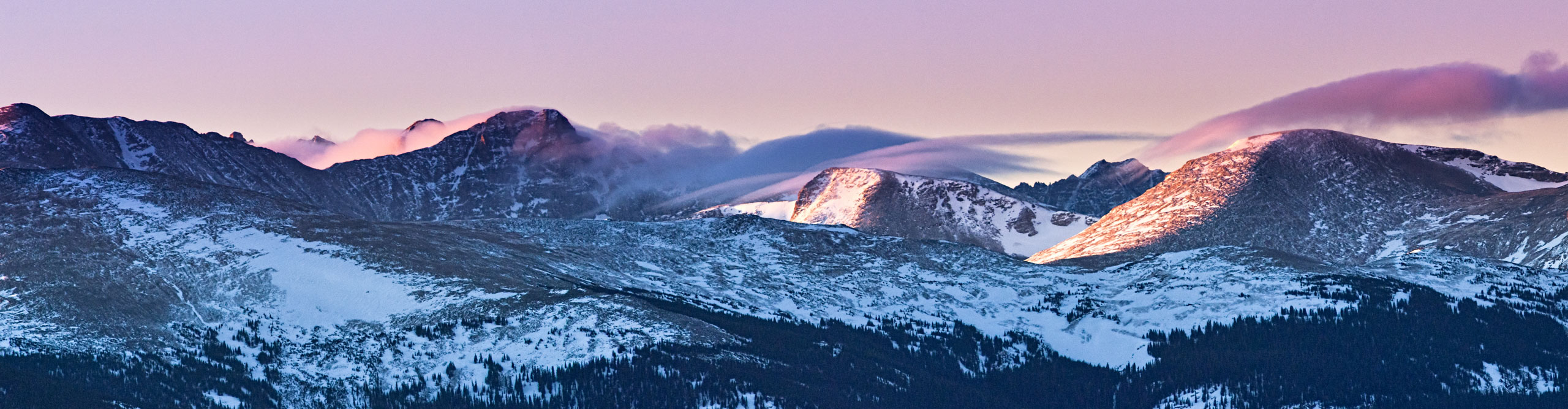 Best Rocky Mountain National Park Tours Holidays 2023 2024 Intrepid   Intrepid Travel United States GettyImages 142825908 2560 Twin Sisters In Rocky Mountain National Park Clouds Roll Over Indian Peaks Of Colorado 