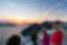 Intrepid group watch the sunset from Oia in Santorini, Cyclades, Greece