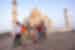 Travellers gather for a group shot in front of the Taj Mahal in the early morning light in Rajasthan