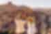 Travellers and local leader overlooking the mountains of Ait Benhaddou, Morocco