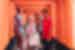Group of Intrepid travellers and leader walking through the Fushimi Inari gates