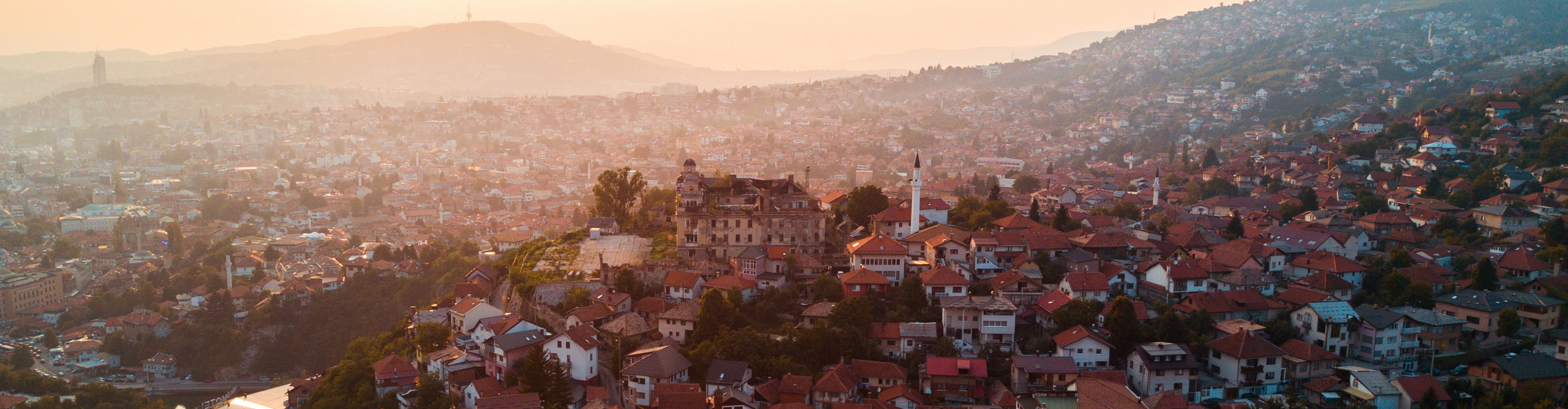 Best Bosnia And Herzegovina Tours Holidays 2024 2025 Intrepid Travel UK   Intrepid Travel Unspecified GettyImages 1308548810 2560 Aerial View Of Sarajevo Cityscape Against Mountain During Sunset Bosnia And Herzegovina EuropeAerial View Of Sarajevo Cityscape During Sunset 