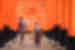 Intrepid travellers having fun while exploring Fushimi Inari shrine walking through the orange gates near Kyoto