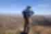 Hiker looking over the Flinders Ranges from lookout point, Australian Outback